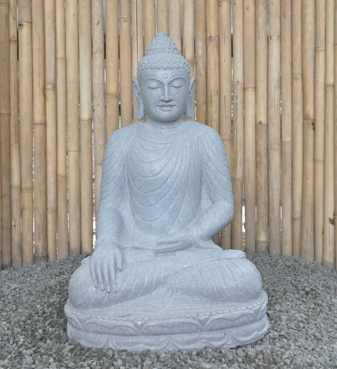  Product image 1 of the product “Seated Buddha made of Riverstone in Bhumisparsha - gesture of touching the earth. 83cm height. ”